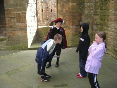 Kids playing in Linlithgow Palace.